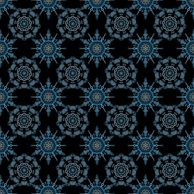 Kusursuz bir geçmişi var. Renkli desenler antika. Siyah arkaplanda mavi renkli çiçek süsü.