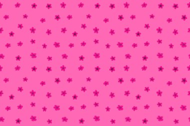 Küçük çiçeklerin içinde sevimli bir çiçek deseni var. Pembe, kahverengi ve morumsu desenler. El çizimi soyut çiçekleri.