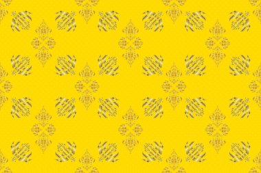 Soyut, pürüzsüz desenli, sarı bir zemin üzerinde altın süslemeler. Altın süslemeli klasik tasarım.