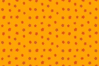 Şirin çiçeklerle kusursuz desen. Hediye paketi için sarı, turuncu ve kırmızı renkli arka plan. Dekorasyon kumaşı. Duvar kağıdı tasarımı. Şık, güzel, pürüzsüz desen..