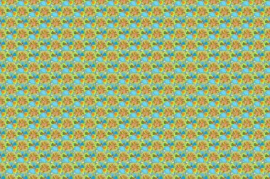 Raster Kozmos 'un kusursuz deseni yeşil, sarı ve mavi renklerde..