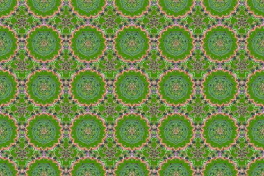 Yeşil arka planda, çok renkli eski süslemeleri olan pürüzsüz bir desen..