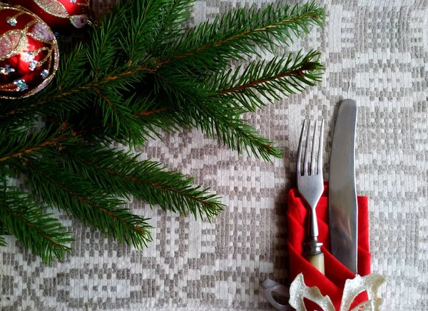 Christmas table setting on a linen tablecloth. Royalty Free Stock Images
