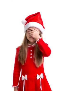 Kapalı kızla Noel Noel Baba şapkası giyen elini gözlerle beyaz bir arka plan üzerinde izole.