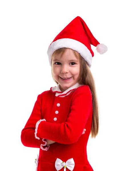 Sonriente chica de Navidad coqueta con un sombrero de santa aislado sobre un fondo blanco. Retrato de imagen —  Fotos de Stock