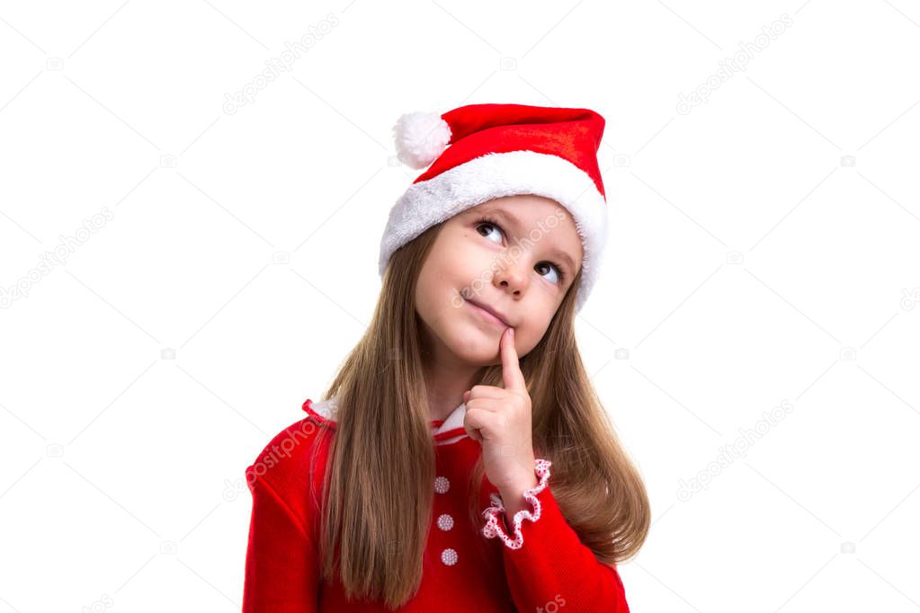 Smiling christmas girl wearing a santa hat isolated over a white background, closeup