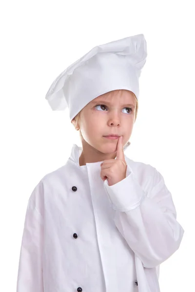 Έξυπνο κορίτσι σοβαρό στολή σεφ λευκό απομονωθεί σε λευκό φόντο, κρατώντας ένα τεντωμένο κοντά η χείλια γωνία. Πορτρέτο εικόνα — Φωτογραφία Αρχείου