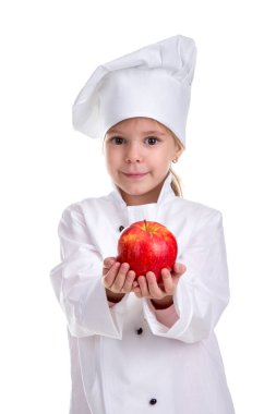 Kırmızı elma, Kol germe veren tür şef kız cap cook üniformalı, gülümseyen. İnsan duyguları, yüz ifadesi duygu, tutum