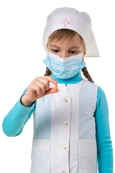 Close up white gown doctor with a pill in the fingers. Front view, portrait orientation — Stock Photo, Image