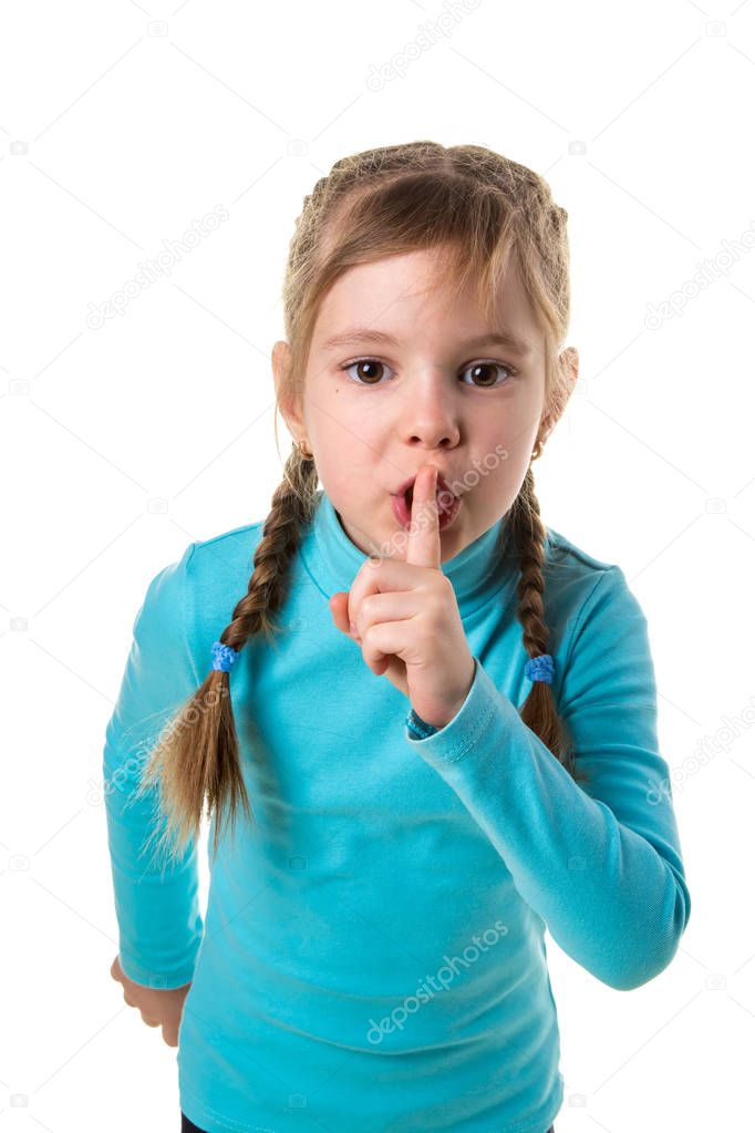 Girl fooling around and point the finger to be quiet, white isolated portrait background
