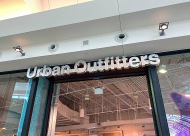 Orlando,FL/USA- 7/4/20:  The exterior sign of the Urban Outfitters retail store at Millenia Mall in Orlando, Florida. clipart