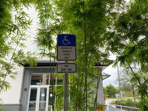 Orlando, FL/USA-8/22/20: A disabled parking spot in a parking garage in an apartment complex.