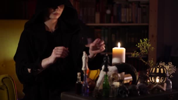 Black magic session with magic elixirs — Stock Video