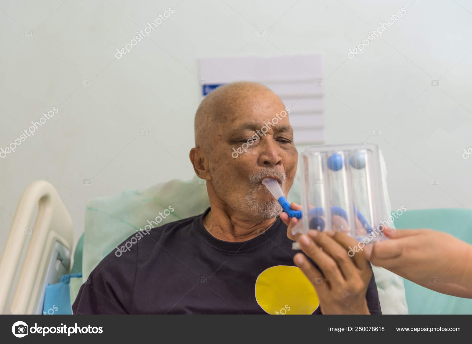 Patient use Incentive Spirometer in hospital Stock Photo by ©PongMoji