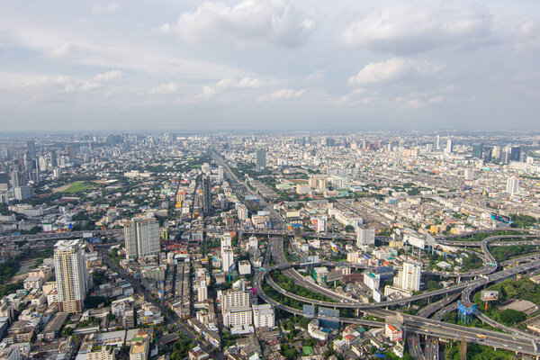 Bangkok, Thailand - August 28, 2016 : Cityscape and transportation with expressway and traffic in daytime from skyscraper of Bangkok. Bangkok is the capital and the most populous city of Thailand.