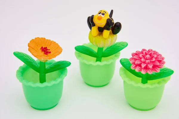 Small Plastic Toy Flowers Pots Toy Lucky Bee Royalty Free Stock Photos