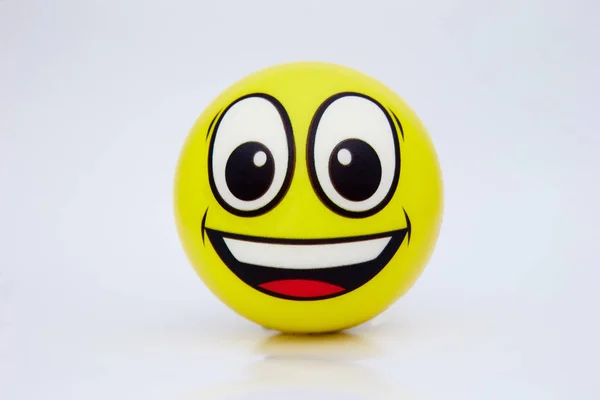 Speelgoed Glimlach Een Witte Achtergrond — Stockfoto