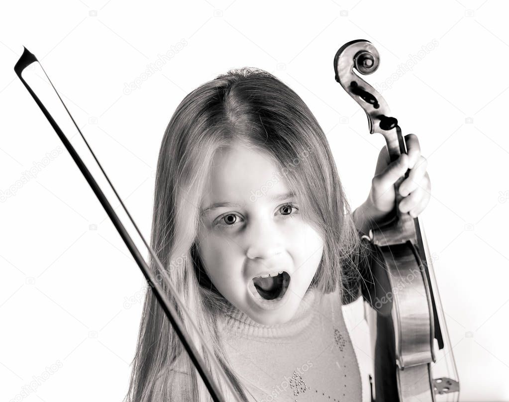 Cute little girl with violin, music and educational concept, iso