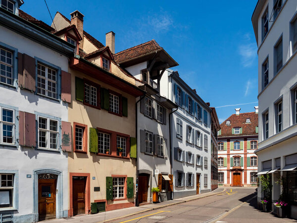 Calm narrow street, sunny summer day, cozy old downtown, Basel, Swiss