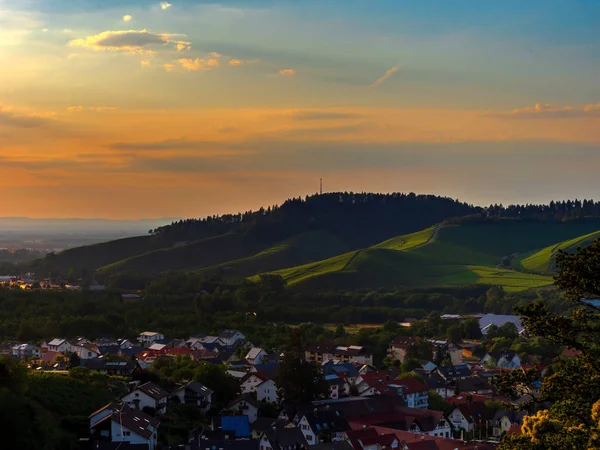 Sunset colors on the vineyards hill in Black Forest