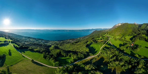 Geneva lake aerial panoramic view from drone, sunset time, France