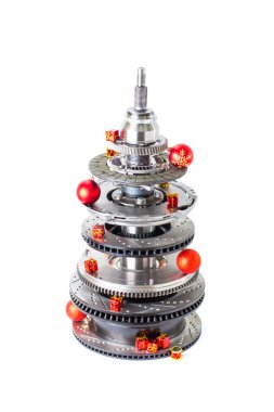 Abstract christmas tree of car parts on a white background. Decorated with Christmas toys, garland clipart