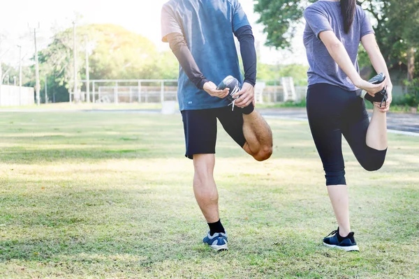 Early Morning Workout Fitness Couple Stretching Outdoors Park Young Man — Stock Photo, Image