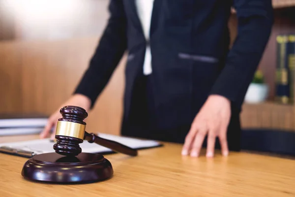 Lawyer judge reading documents at desk in courtroom working on w — Stock Photo, Image