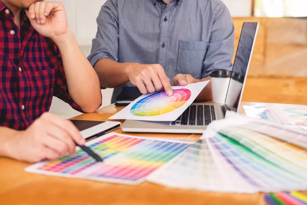 team Web designer working drawing something on graphic computer