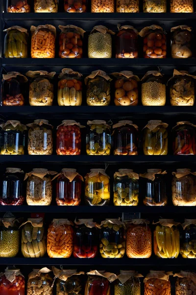 Local traditional food concept. Glass jars with pickled vegetables — Stock Image Local traditional food concept. Glass jars with pickled vegetables Royalty Free Stock Images
