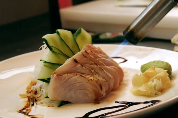 Mutfak meşale yanmak çipura, Çipura balığı üzerinde