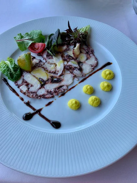 Roast carpaccio octopus - restaurant serving a dish from the chef Seafood — Stock Photo, Image