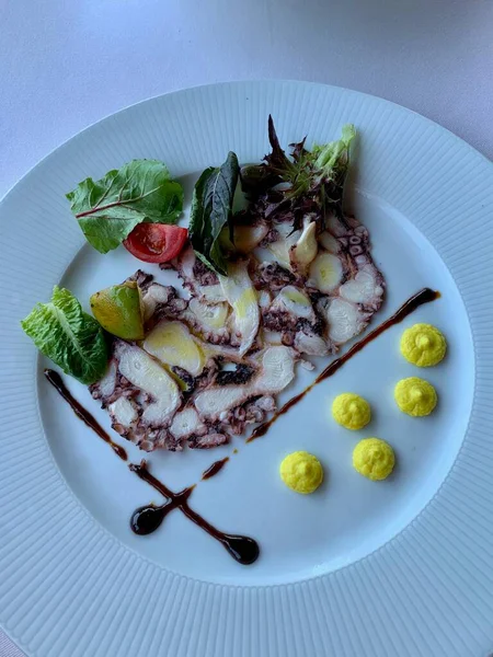 Roast carpaccio octopus - restaurant serving a dish from the chef Seafood — Stock Photo, Image