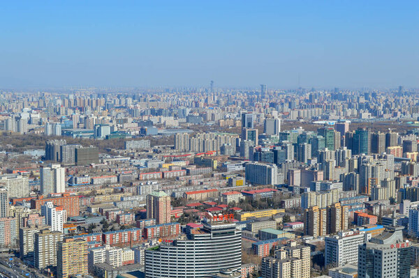 Beijing / China - March 1, 2014: Aerial view of downtown Beijing, view from the Central Radio and TV Tower in Beijing