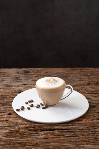 cappuccino coffee clear cup on wood background  for cafe coffee shop menu