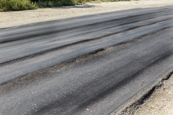 Carretera Dañada Asfalto Picado Dañado Con Baches Mancha Muy Mal —  Fotos de Stock