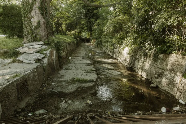 City Canal Drainages to prevent floods. Concrete drainage channel for the transportation of sewage during heavy rains and floods coming from the mountains. Urban sewer collector