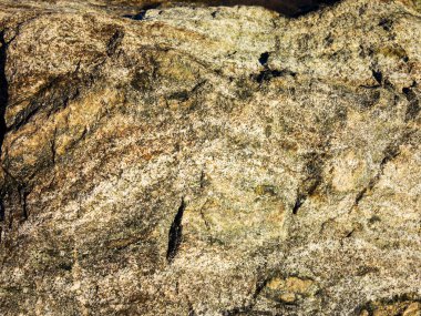 Benekli granit volkanik kaya inşaat, mutfak tezgahı, vb için bir kaplama malzemesi olarak kullanılan taş arka plan.