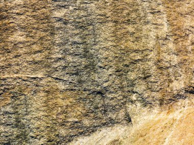 Benekli granit volkanik kaya inşaat, mutfak tezgahı, vb için bir kaplama malzemesi olarak kullanılan taş arka plan.