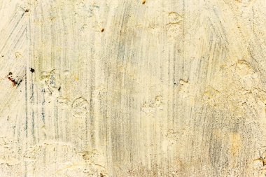 Arka plan beton duvar, yıpranma izleri yıpranmış duvar hasarlı eski boya. Boyalı beton yüzeyde eski boya kalıntıları var. Pis beton yüzey. 