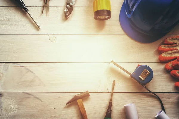 Directly Above Shot Of Work Tools On Table
