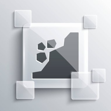 Gri arka planda gri heyelan simgesi izole edildi. Taşlar kayadan düşer. Kayalar tepeden aşağı yuvarlanıyor. Kaya gibi. Kare cam paneller. Vektör İllüstrasyonu.