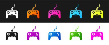 Gamepad simgesini siyah ve beyaz arkaplanda izole et. Oyun kontrolörü. Vektör.