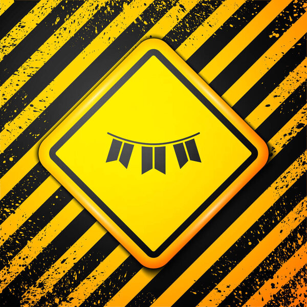 Black Carnival garland with flags icon isolated on yellow background. Party pennants for birthday celebration, festival decoration. Warning sign. Vector.