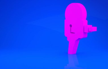 Pembe Retro sinema kamerası ikonu mavi arkaplanda izole edilmiş. Video kamera. Film tabelası. Film projektörü. Minimalizm kavramı. 3 boyutlu illüstrasyon. 3 Boyutlu Hazırlama