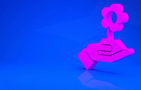 Mano rosa sosteniendo icono de la flor aislado sobre fondo azul. Semillas y plántulas. Plantando plantones. Concepto de ecología. Concepto minimalista. Ilustración 3d. Renderizado 3D —  Fotos de Stock