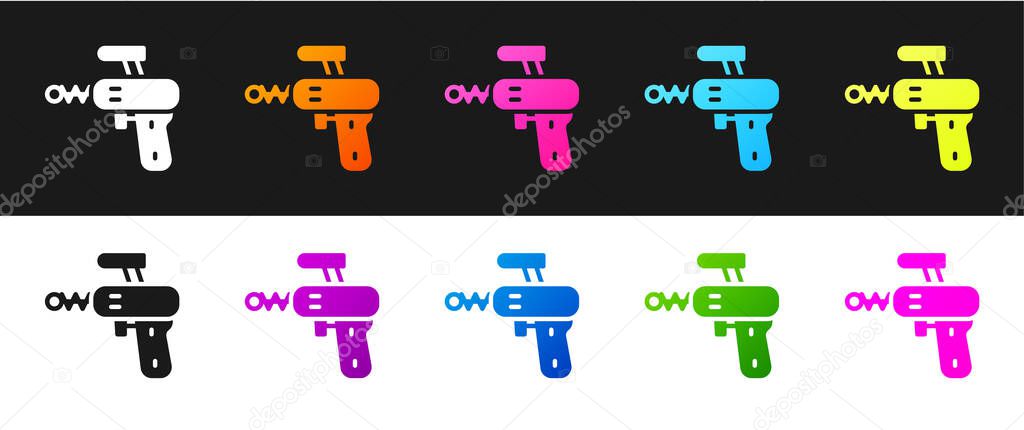 Set Ray gun icon isolated on black and white background. Laser weapon. Space blaster. Vector