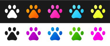 Siyah ve beyaz arkaplanda Paw yazdırma simgesini ayır. Köpek ya da kedi pençesi izi. Hayvan izleri. Vektör