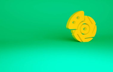 Yeşil zemin üzerinde kalibre simgesi olan turuncu araba fren diski. Minimalizm kavramı. 3d illüstrasyon 3B canlandırma.