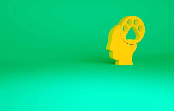 Cabeza humana naranja con icono de huella animal aislado sobre fondo verde. Pata de mascota en el corazón. Amor a los animales. Concepto minimalista. 3D ilustración 3D render —  Fotos de Stock